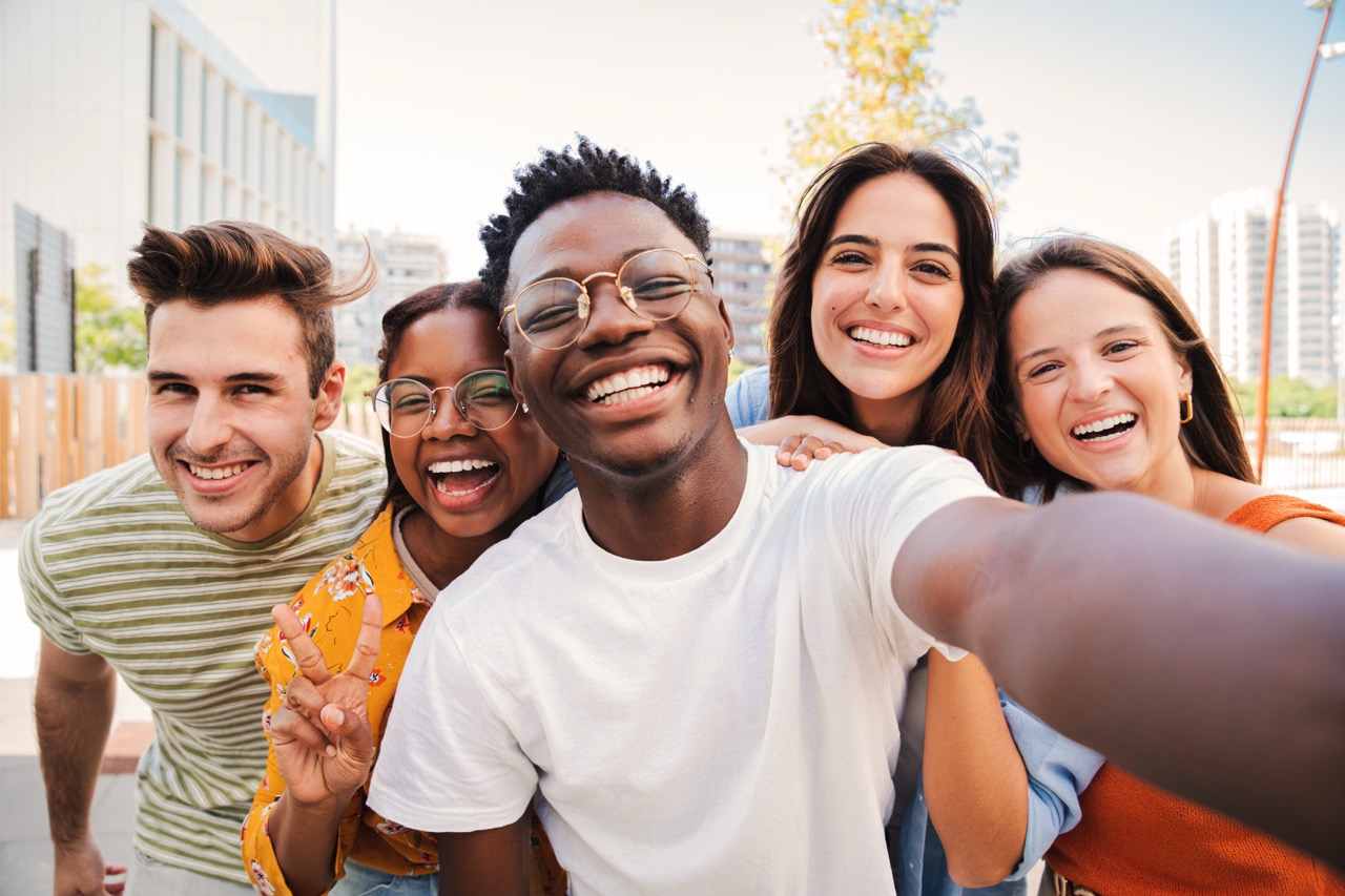 a group of friends taking a selfie together